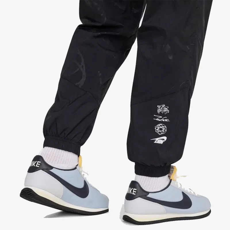 Nike Donji dio trenerke M NSW BREAKING LND WR PANT 
